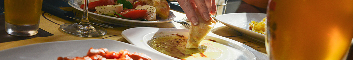 Eating Greek Mediterranean at TINOS GREEK CAFE restaurant in Austin, TX.